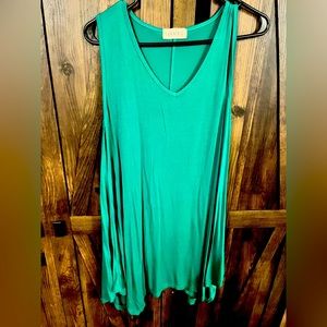 Large sleeveless green top